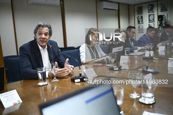 Finance Minister Fernando Haddad talks to journalists during a breakfast at the Finance Ministry in Brasilia, Brazil, on December 20, 2024. 