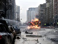 Firefighters put out a fire in the street in the Holosiivskyi district after a Russian missile attack in Kyiv, Ukraine, on December 20, 2024...