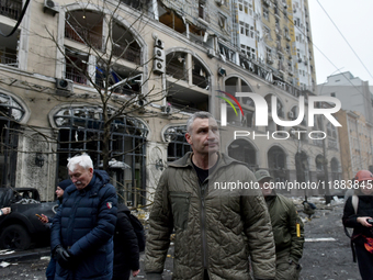 In Kyiv, Ukraine, on December 20, 2024, Kyiv city head Vitali Klitschko examines buildings in the Holosiivskyi district damaged by a Russian...