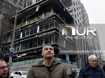 In Kyiv, Ukraine, on December 20, 2024, Kyiv city head Vitali Klitschko examines buildings in the Holosiivskyi district damaged by a Russian...