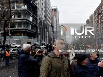 In Kyiv, Ukraine, on December 20, 2024, Kyiv city head Vitali Klitschko examines buildings in the Holosiivskyi district damaged by a Russian...