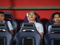 Vireak Dara sits on the substitutes bench during the Mitsubishi Electric Cup 2004 Group A match between Thailand and Cambodia at Rajamangala...