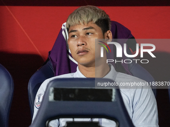 Vireak Dara sits on the substitutes bench during the Mitsubishi Electric Cup 2004 Group A match between Thailand and Cambodia at Rajamangala...