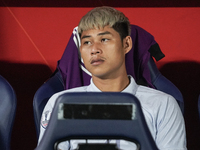 Vireak Dara sits on the substitutes bench during the Mitsubishi Electric Cup 2004 Group A match between Thailand and Cambodia at Rajamangala...