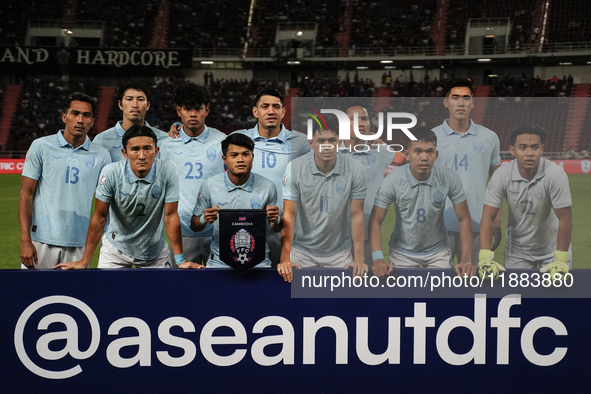 The Cambodia National Football Team squad poses for photos before the Mitsubishi Electric Cup 2004 Group A match between Thailand and Cambod...