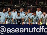 The Cambodia National Football Team squad poses for photos before the Mitsubishi Electric Cup 2004 Group A match between Thailand and Cambod...