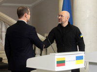 Prime Minister of Ukraine Denys Shmyhal shakes hands with Prime Minister of the Republic of Lithuania Gintautas Paluckas during a joint news...