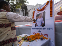 Congress supporters pay tribute to Mridul Islam, who dies on Wednesday after participating in a Congress protest march to Raj Bhawan in Guwa...