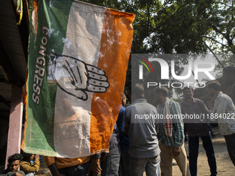 Congress party supporters arrive to stage a protest against the state government over the death of a party worker in Guwahati, India, on Dec...