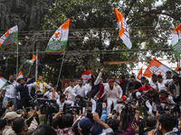 Indian Youth Congress supporters stage a protest against the state government over the death of a party worker in Guwahati, India, on Decemb...