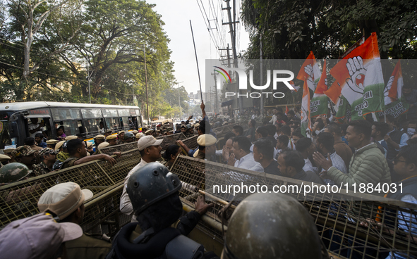 Indian Youth Congress supporters stage a protest against the state government over the death of a party worker in Guwahati, India, on Decemb...