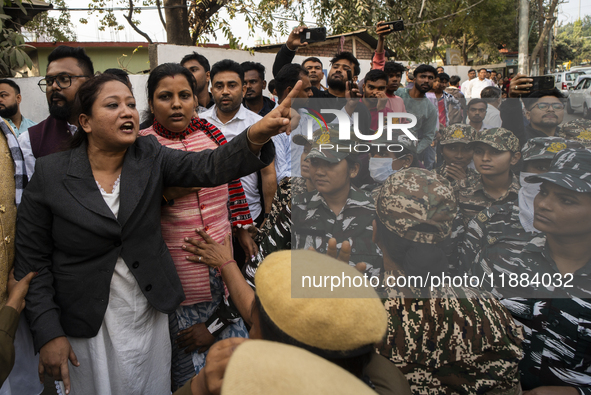 Indian Youth Congress supporters stage a protest against the state government over the death of a party worker in Guwahati, India, on Decemb...