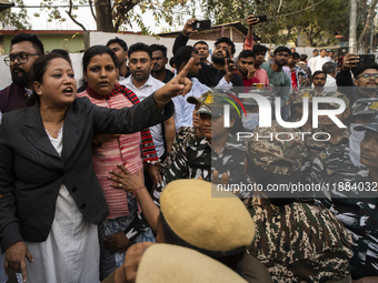 Indian Youth Congress supporters stage a protest against the state government over the death of a party worker in Guwahati, India, on Decemb...