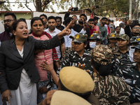 Indian Youth Congress supporters stage a protest against the state government over the death of a party worker in Guwahati, India, on Decemb...