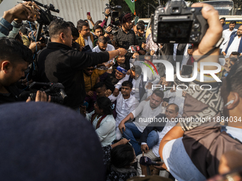 Indian Youth Congress supporters stage a protest against the state government over the death of a party worker in Guwahati, India, on Decemb...