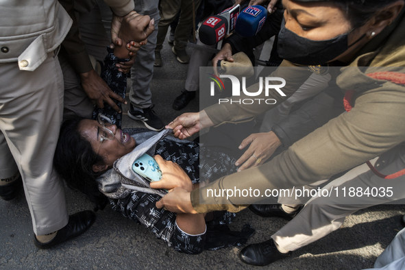 Police detain Indian Youth Congress supporters during a protest against the state government over the death of a party worker in Guwahati, I...