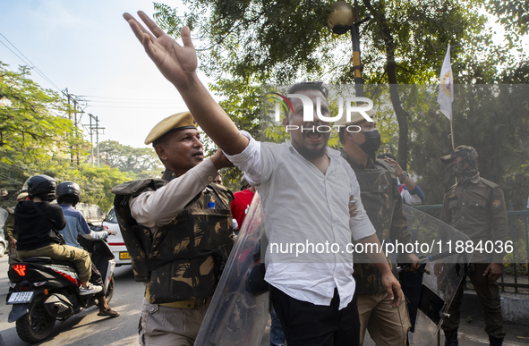 Police detain Indian Youth Congress supporters during a protest against the state government over the death of a party worker in Guwahati, I...