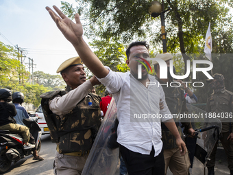 Police detain Indian Youth Congress supporters during a protest against the state government over the death of a party worker in Guwahati, I...