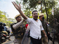 Police detain Indian Youth Congress supporters during a protest against the state government over the death of a party worker in Guwahati, I...