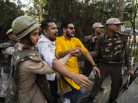 Police detain Indian Youth Congress supporters during a protest against the state government over the death of a party worker in Guwahati, I...