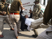 Police detain Indian Youth Congress supporters during a protest against the state government over the death of a party worker in Guwahati, I...