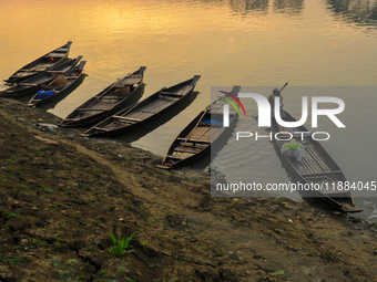 Local vegetable cultivators bring their vegetables to the local wholesale vegetable market after transporting them on a boat in the Tooker B...