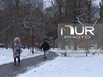 Toronto, in Ontario, Canada, on December 20, 2024, receives a light coating of snow. Around two centimeters of snow are anticipated to accum...