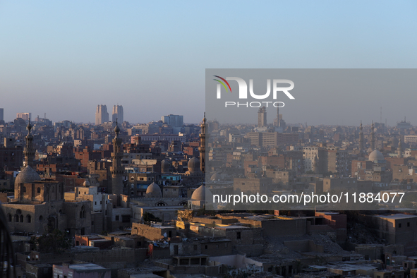 The sun sets in Old Cairo, Egypt, on December 20, 2024. (