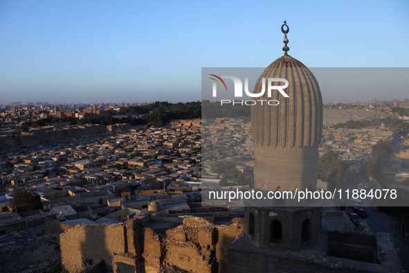 The sun sets in Old Cairo, Egypt, on December 20, 2024. (