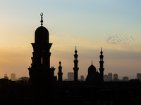 The sun sets in Old Cairo, Egypt, on December 20, 2024. (