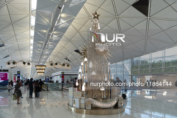 A Dior Christmas tree is seen in the Hong Kong International Airport in Hong Kong, China, on December 1, 2024. 