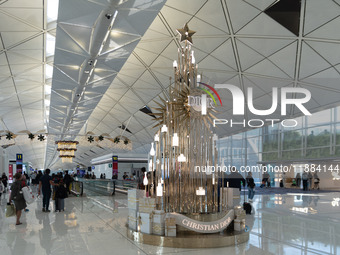 A Dior Christmas tree is seen in the Hong Kong International Airport in Hong Kong, China, on December 1, 2024. (