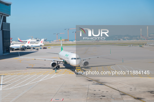 An Airbus A321 of Eva Airways pushes back from the gate at the Hong Kong International Airport in Hong Kong, China, on December 1, 2024. 