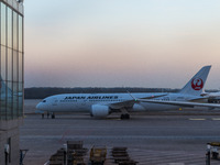 A Boeing 787-8 Dreamliner of Japan Airlines gets ready for takeoff at the Beijing Capital International Airport in Beijing, China, on Decemb...