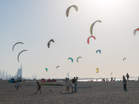 In Dubai, United Arab Emirates, kite surfers fill the sky with kites on a beach in Jumeirah. (