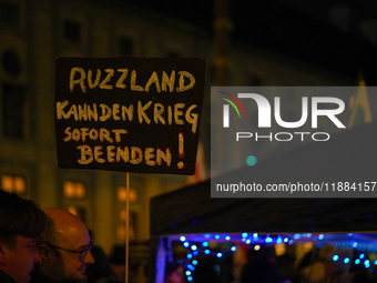 A demonstration takes place at Odeonsplatz in Munich, Germany, on December 20, 2024, in support of the people in Ukraine. The participants d...