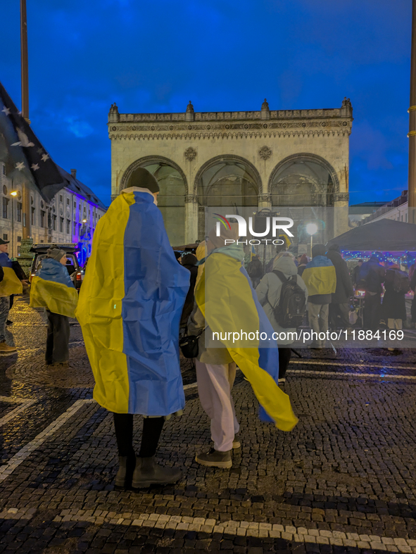 A demonstration takes place at Odeonsplatz in Munich, Germany, on December 20, 2024, in support of the people in Ukraine. The participants d...