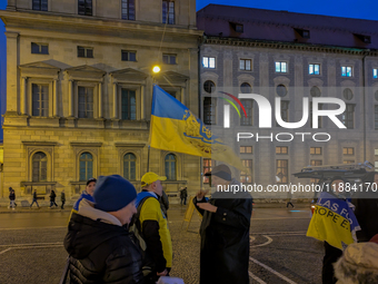 A demonstration takes place at Odeonsplatz in Munich, Germany, on December 20, 2024, in support of the people in Ukraine. The participants d...