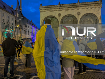 A demonstration takes place at Odeonsplatz in Munich, Germany, on December 20, 2024, in support of the people in Ukraine. The participants d...