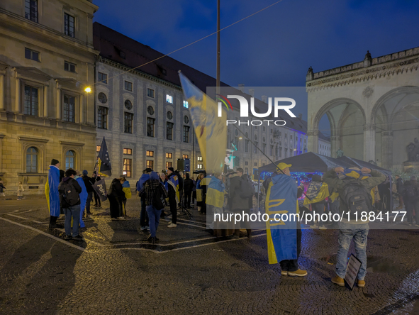 A demonstration takes place at Odeonsplatz in Munich, Germany, on December 20, 2024, in support of the people in Ukraine. The participants d...