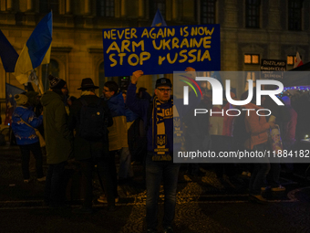 A demonstration takes place at Odeonsplatz in Munich, Germany, on December 20, 2024, in support of the people in Ukraine. The participants d...