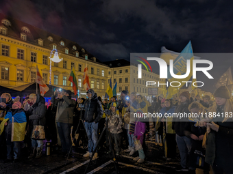 A demonstration takes place at Odeonsplatz in Munich, Germany, on December 20, 2024, in support of the people in Ukraine. The participants d...