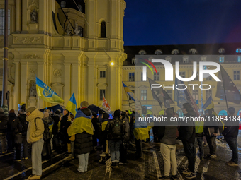 A demonstration takes place at Odeonsplatz in Munich, Germany, on December 20, 2024, in support of the people in Ukraine. The participants d...