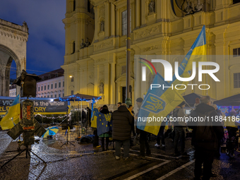 A demonstration takes place at Odeonsplatz in Munich, Germany, on December 20, 2024, in support of the people in Ukraine. The participants d...