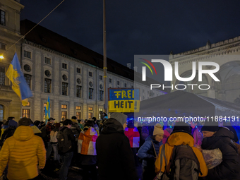 A demonstration takes place at Odeonsplatz in Munich, Germany, on December 20, 2024, in support of the people in Ukraine. The participants d...