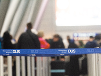 A general view of a crowd of travelers is seen at Duesseldorf Airport in Duesseldorf, Germany, on December 20, 2024, ahead of the Christmas...