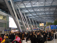 A general view of a crowd of travelers is seen at Duesseldorf Airport in Duesseldorf, Germany, on December 20, 2024, ahead of the Christmas...