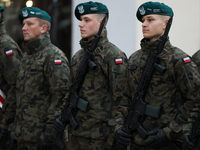 Polish Army soldiers are seen on the Main Square in Krakow, Poland, on November 24, 2024. (