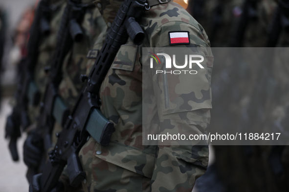 Polish Army soldiers are seen on the Main Square in Krakow, Poland, on November 24, 2024. 