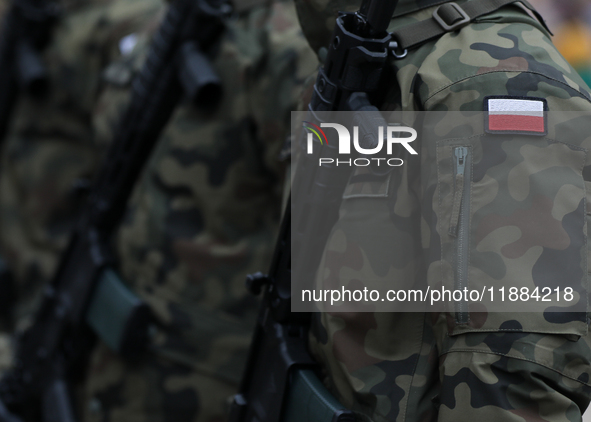 Polish Army soldiers are seen on the Main Square in Krakow, Poland, on November 24, 2024. 